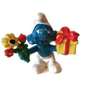 schtroumpf avec fleur + cadeau 1978 PEYO schleich